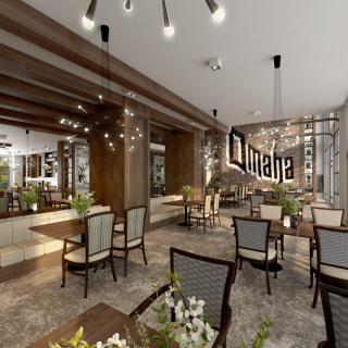 A modern restaurant interior with elegant chandeliers and a cozy dining setup.