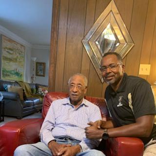 A moment shared between two generations.