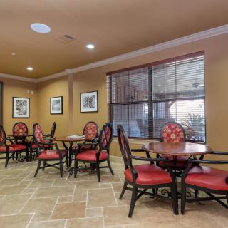 A cozy dining area with elegant decor and comfortable seating.