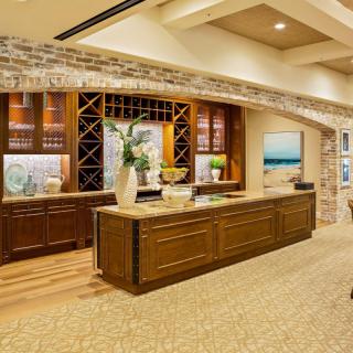 A modern reception area with elegant wooden furniture and tasteful decor.