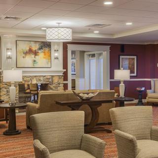 A modern lobby area with comfortable seating and elegant decor.