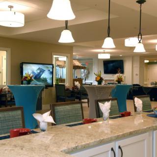 A modern lobby area with stylish lighting and comfortable seating arrangements.