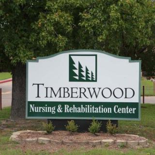 Sign for Timberwood Nursing & Rehabilitation Center.