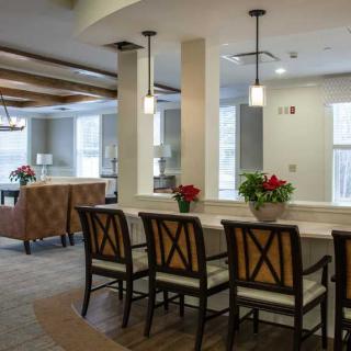 A modern dining area with stylish seating and decor.