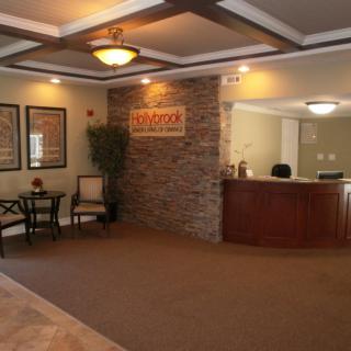 A welcoming lobby area with a reception desk and seating.