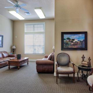 A cozy living room with comfortable seating and tasteful decor.