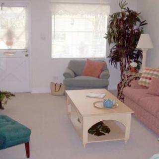 A cozy living room with comfortable seating and a coffee table.