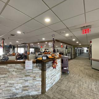 A welcoming reception area featuring modern decor and a spacious layout.