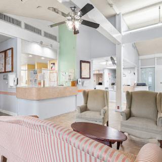 A welcoming lobby area with comfortable seating and a reception desk.