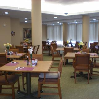 An inviting dining area with neatly arranged tables and chairs.