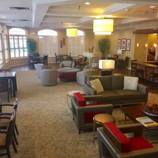 A modern lobby with comfortable seating and elegant lighting.