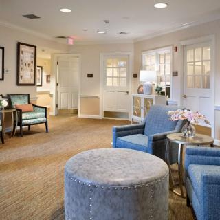 A cozy lobby area with comfortable seating and elegant decor.