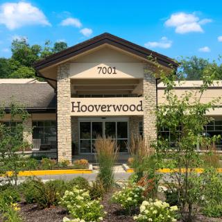 The entrance of Hooverwood, beautifully integrated with its natural surroundings.