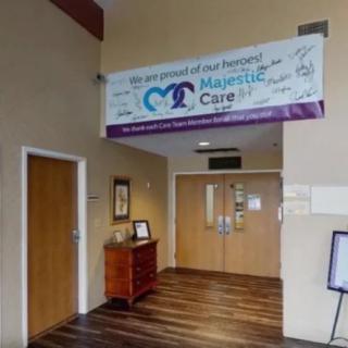 Entrance area of a healthcare facility with a welcoming banner and hallway.