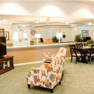 A cozy and warmly decorated living and dining area with comfortable seating and stylish furnishings.