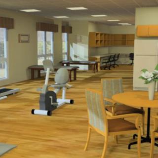 A modern interior with gym equipment and a wooden floor.