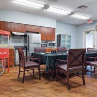 A cozy kitchen and dining area equipped with essentials.
