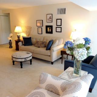 A cozy living room with elegant decor and comfortable seating.