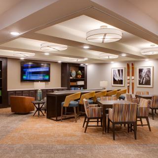 A modern lounge area with comfortable seating and stylish decor.