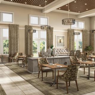 Elegant dining area with natural light and neutral decor.