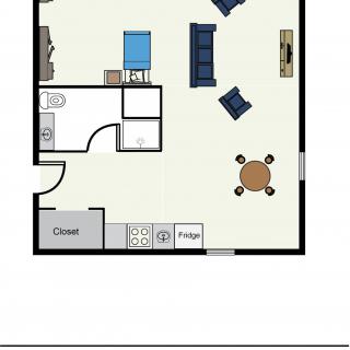A simple floor plan showing the layout of a living space, including a kitchen, bathroom, and living area with furniture.
