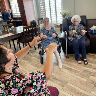 Engaging seniors in a joyful activity session at a community center.