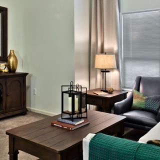 A cozy living room featuring comfortable seating and stylish decor.
