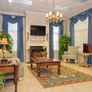 A classic living room with elegant furnishings and a cozy atmosphere.