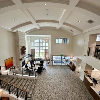 A spacious and modern lobby with elegant furnishings and abundant natural light.