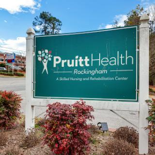 Signage for PruittHealth Rehabilitation Center, indicating a facility focused on nursing and rehabilitation services.
