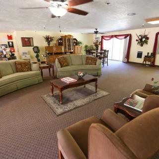 Spacious living room with comfortable seating and elegant decor.