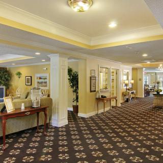 A well-decorated lobby area with comfortable seating and ambient lighting.