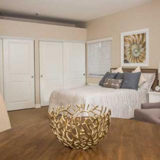 A modern and cozy bedroom interior with stylish decor.