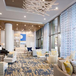 A modern lounge area featuring contemporary furniture and decor.