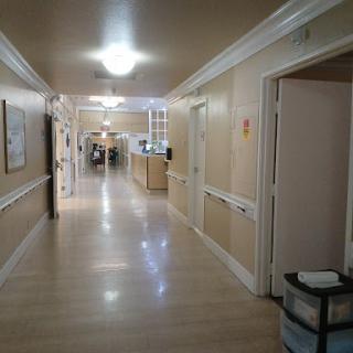 A clean and well-lit hallway in a hospital.