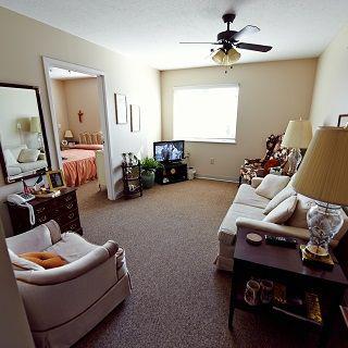 A cozy living room with comfortable seating and classic decor.