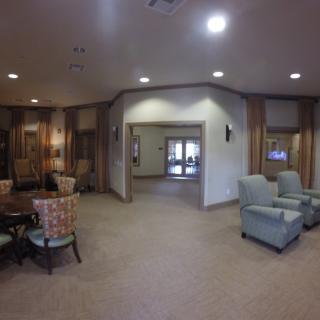 A cozy lobby interior with comfortable seating and soft lighting.