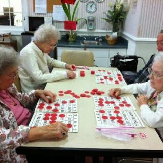 Seniors enjoying a lively game of bingo at the community center.