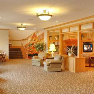 A cozy hotel lobby with comfortable seating and warm lighting.