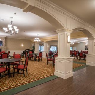 A spacious dining area with elegant decor and comfortable seating.