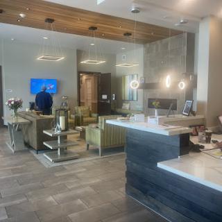 A modern lobby featuring comfortable seating and a welcoming atmosphere.