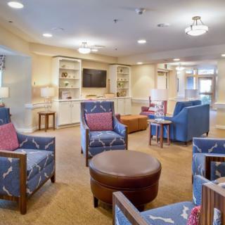 A cozy living room with comfortable seating and a television setup.