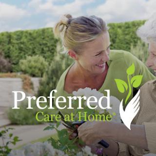 A caregiver and an elderly person enjoying a moment together while gardening, showcasing the essence of home care.