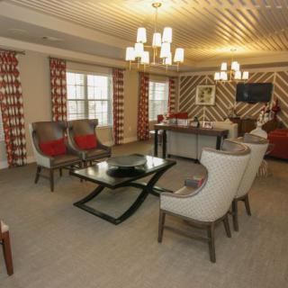 A modern and stylish living room with elegant furniture and contemporary decor.