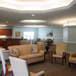 A cozy living room with comfortable seating and subtle decor.