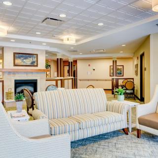 A modern lobby with comfortable seating and elegant decor.