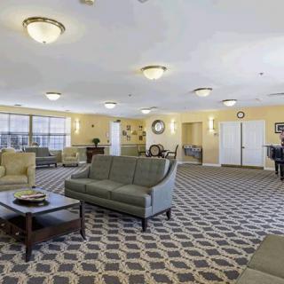 Spacious lobby with comfortable seating and elegant decor.