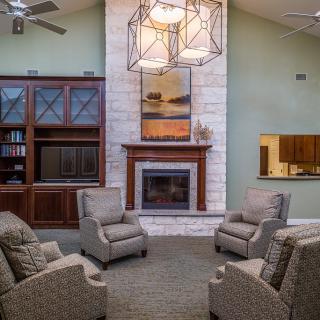 Cozy living room with a fireplace and comfortable seating.