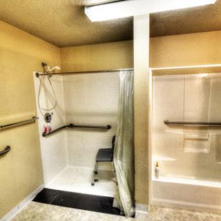 An accessible shower space designed for safety and ease of use.
