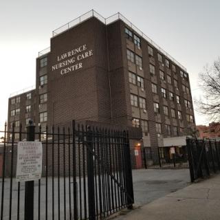 The exterior view of a healthcare center located in an urban area.